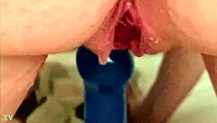 Amateur woman squirts on dildo during solo play