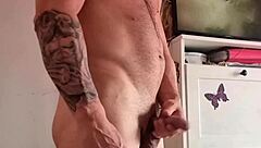 The blonde watches her stud touch himself lightly in this intimate scene.