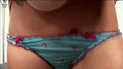 solo girl performs softcore masturbation routine