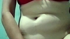 Amateur girl shows her wet, hairy pussy during homemade masturbation.