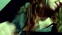 Feeling the intense pleasure of a hand job from a redhead