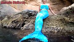 Mermaid slut sucks sailor's cock outdoors with friends watching