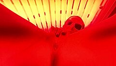 feeling the thrill of masturbating in the public tanning bed outdoors