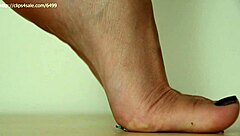 Ms Dom destroys feet fetish fantasies with tall domination and crushing