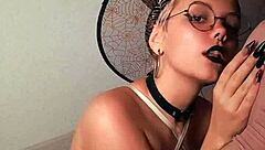 the young goth witch's mouth fills with cum after sucking cock