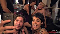 Busty babe in bondage sucks cock outdoor before riding with voyeurs watching her big tits bounce in kinky group