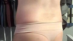 Gay guy in pink underwear struts his stuff