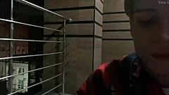 Casey Donovan and David Galager sucking on holiday balcony