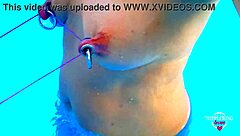 nippleringlover stretches pierced nipples bound in pool