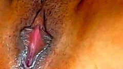 Stepmom's pussy gets wet while playing with a black cock