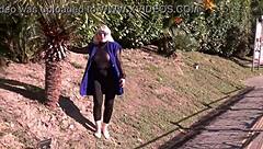 Blonde mature flashes her nylon-clad breasts