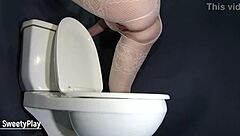 i found a strange method to use the bathroom in fishnets