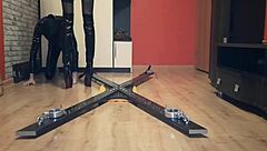 dominatrix nika chains slave on cross, sits ass on face, forces pussy licking