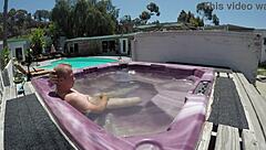 dayanara relaxes naked in the hot tub