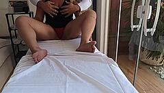 Married woman touched by therapist during tantric massage
