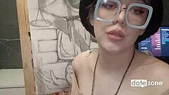 Homemade video of glasses-wearing amateur with oiled up tits