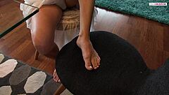 Jasmine Rouge's beautiful feet give a perfect footjob
