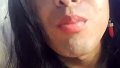 Lechita enjoys a messy facial in this sissy CD video