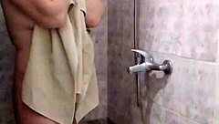 spy takes a shower with milf bathing.