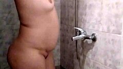 spy takes a shower with milf bathing.