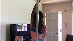 Felicity Feline's seductive pole dancing in lingerie and ripped clothes