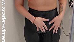 Hey, check out this hot babe in sports bra and leggings getting off in the shower! 😏