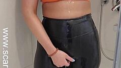 Hey, check out this hot babe in sports bra and leggings getting off in the shower! 😏