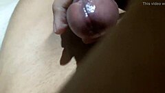 Intense close-up of a young gay boy's homemade masturbation session
