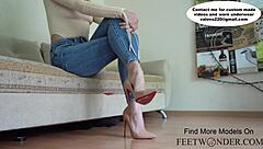 sexy girl in jeans dangles expensive louboutin pumps