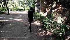 Outdoors, getting naked in Barcelona park.