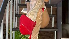 Milf relaxes on stairs with stockings and lingerie