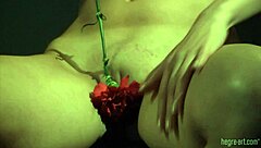 Elvira Red Flower in teasing softcore solo scene