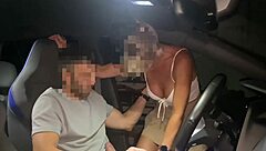 Hot couple gets frisky in the car with a handjob and fucking in the parking lot