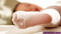 hottie delivers kinky footjob and handjob to european babe.