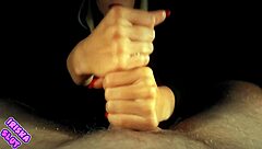 Blonde gives oiled handjob leading to huge cumshot orgasm