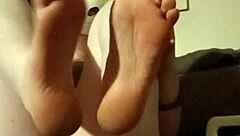 Kinky amateur in purple lace lingerie worships feet with fetish play!