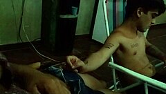 A young redhead girl sits on a young guy's lap in a pov scene.