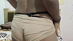 is rica travesti masturbating in crossdressing attire, teasing with her transsexual body in this provocative scene?