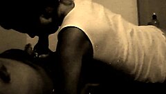 Black and white amateur couple shares intimate moments