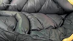 Cumming hard on satin sheets with down jacket