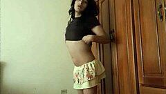 Transvestite dancing at Ecuador store