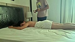 Young latina teen gives handjob to horny masseur at home