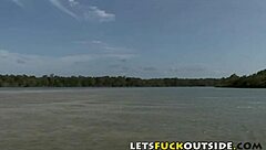 Blonde gets crazy double penetration outside in water