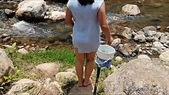 i'm washing clothes in the river