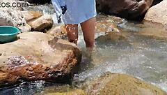 i'm washing clothes in the river