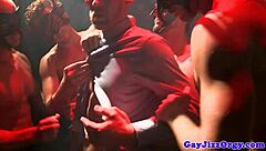 blindfolded hunk gets presented with a cock in the orgy