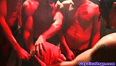 blindfolded hunk gets presented with a cock in the orgy