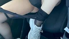 joven masturbates in car wearing stockings