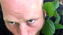 Hunk gives deepthroat blowjob to monster cock in outdoor nature setting
