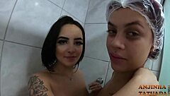 Sexy teen Duda Pimentinha takes a bath with her friend, showing natural tits and big ass